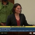 mia Mia Gregorson giving a press conference