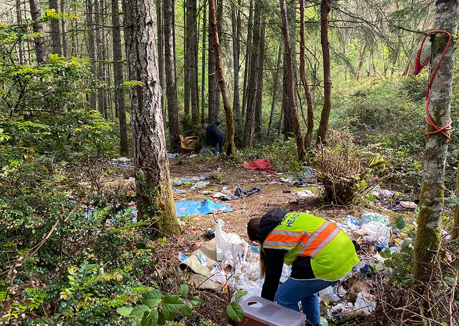 Kitsap REALTORS2 cleaning up homeless encampment
